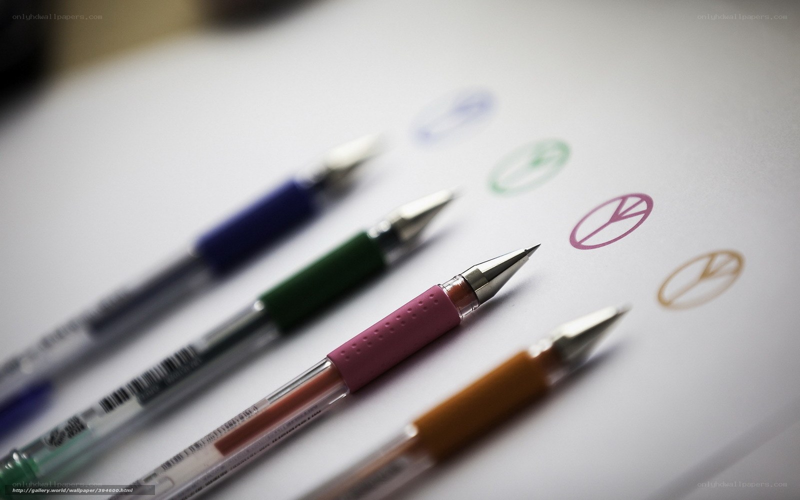 Colorful pens on paper