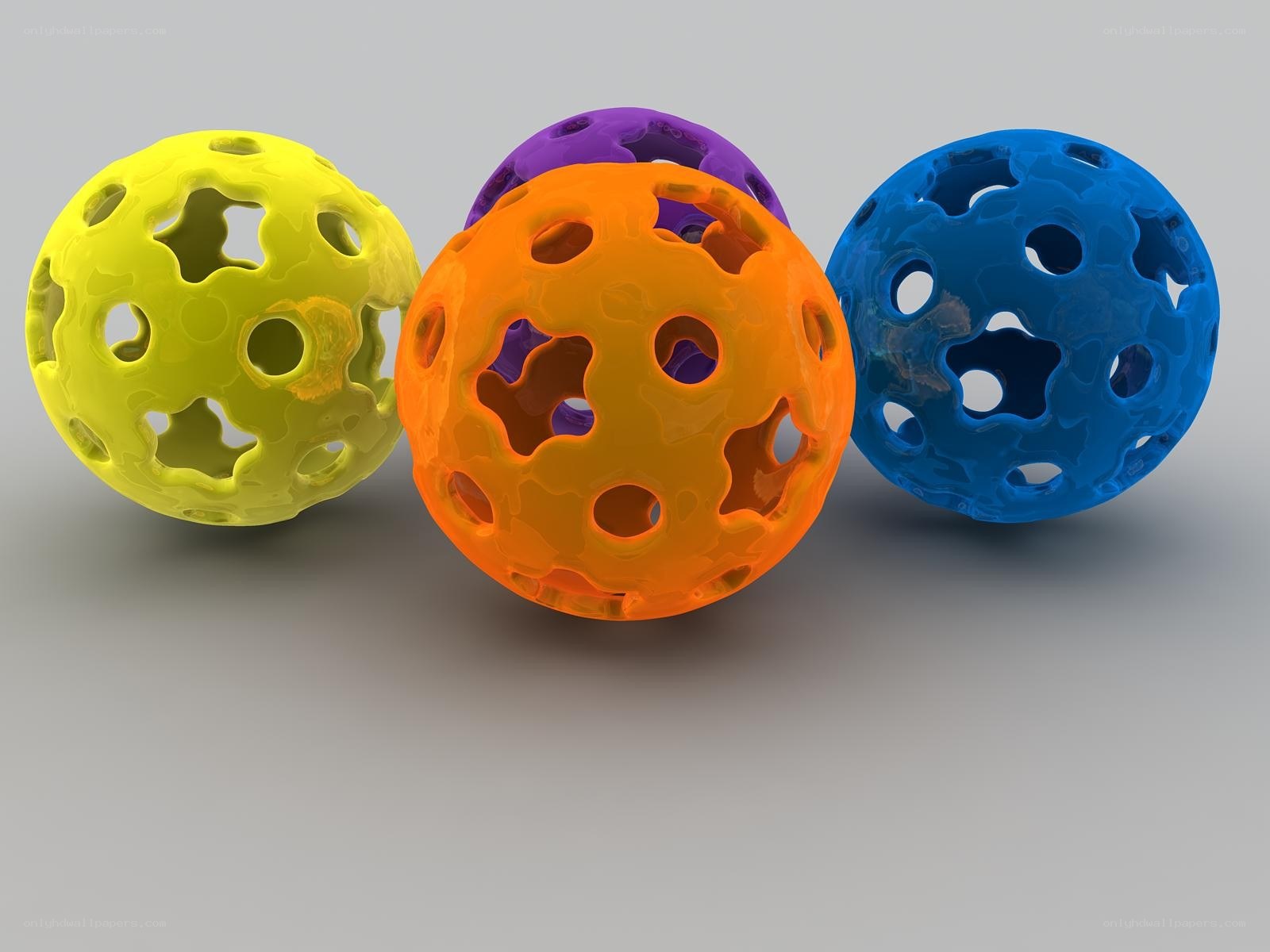 Colorful perforated spheres