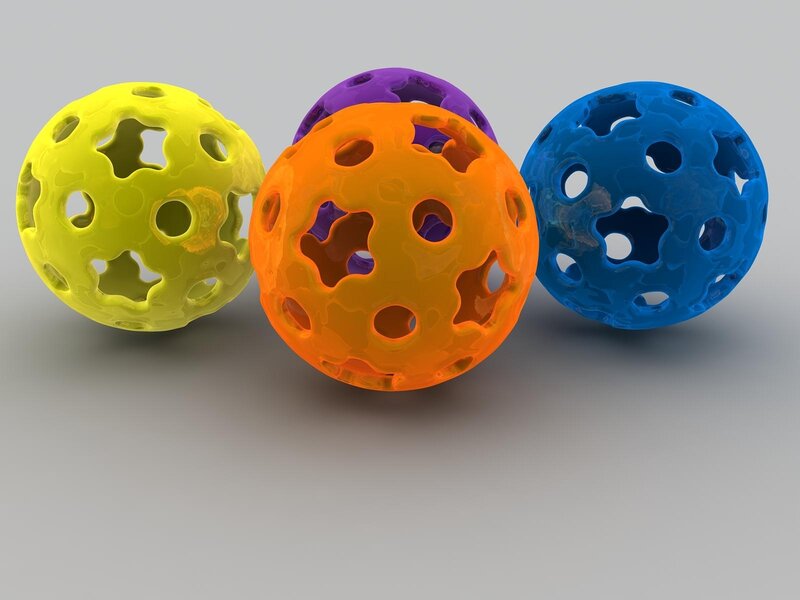 Colorful perforated spheres