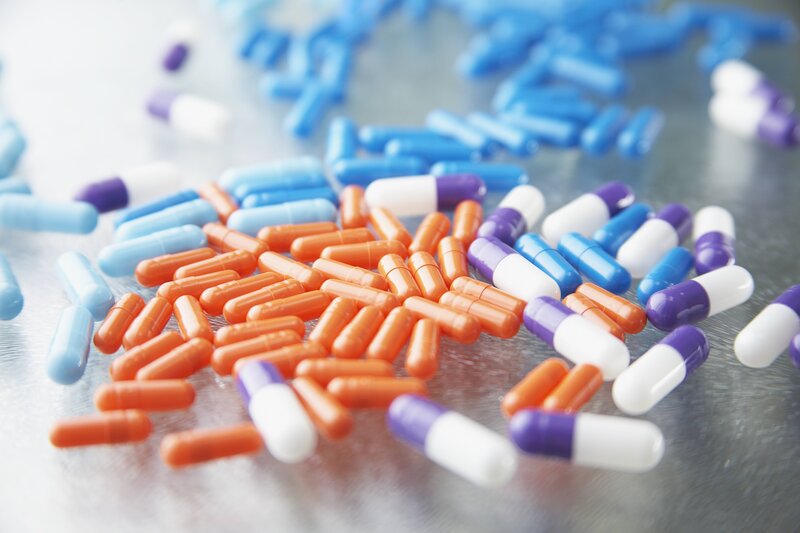 Colorful pills on a surface