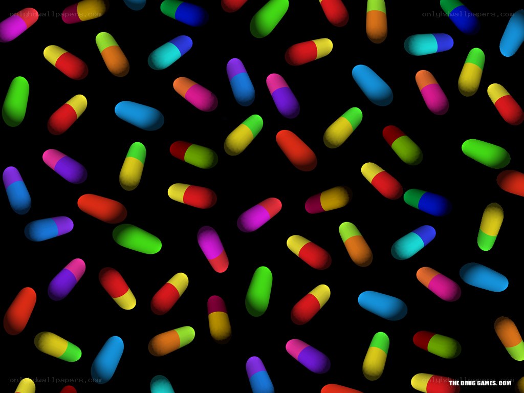 colorful pills on black background