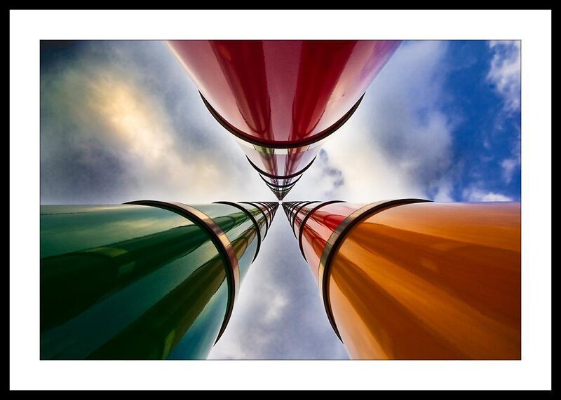 Colorful pipes converging upward