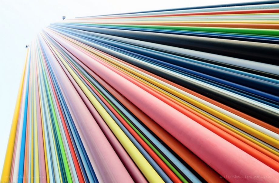Colorful pipes converging upward