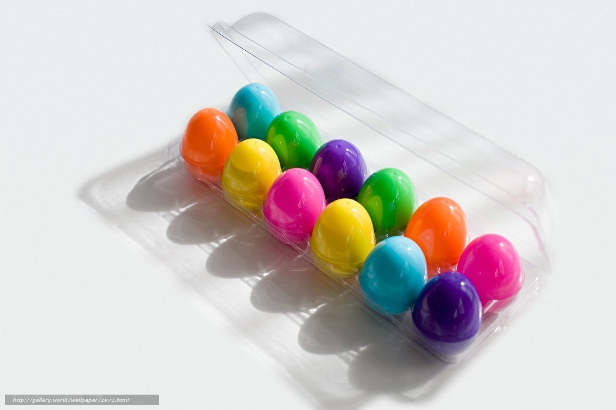 Colorful plastic eggs in a tray