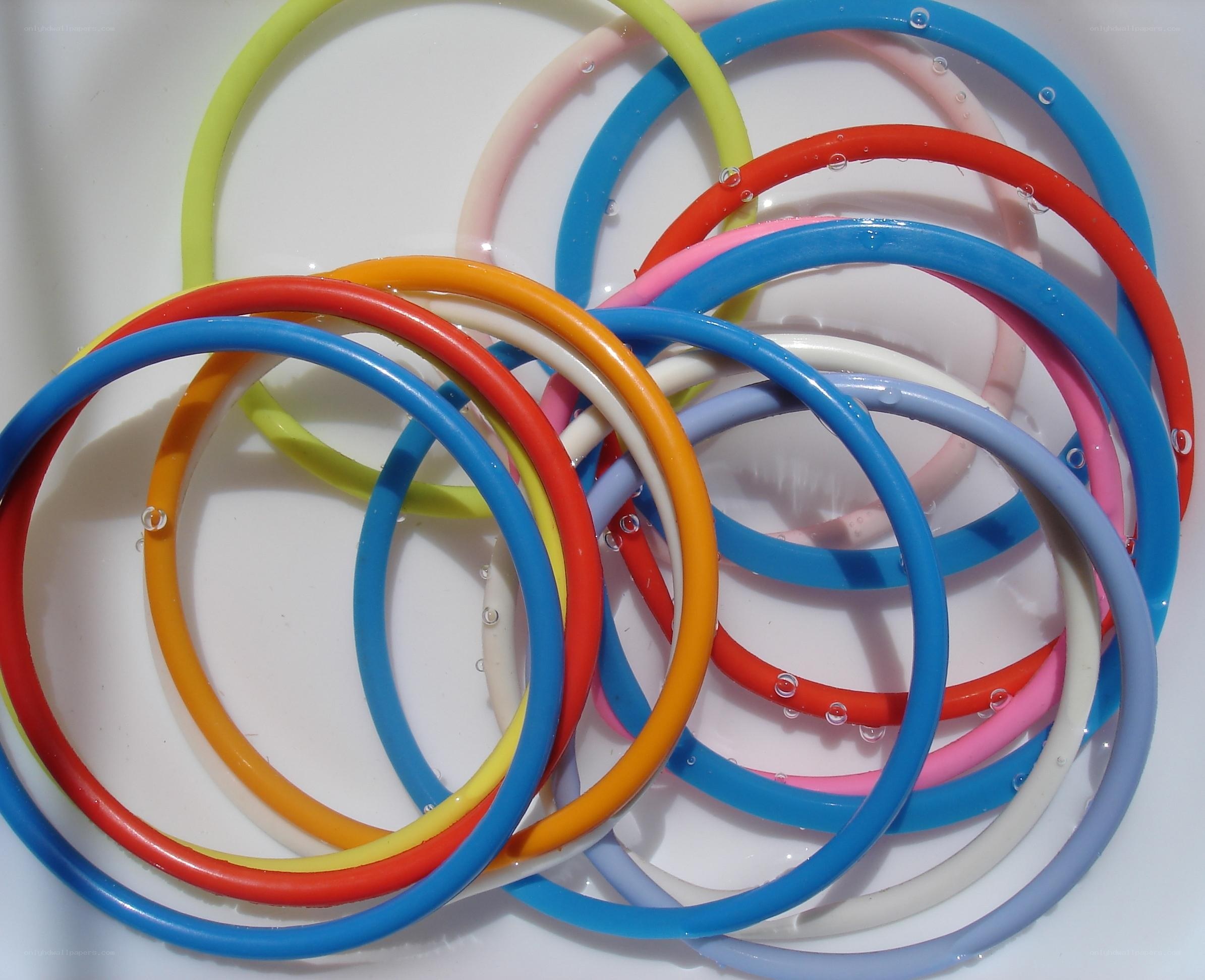 Colorful plastic rings in water
