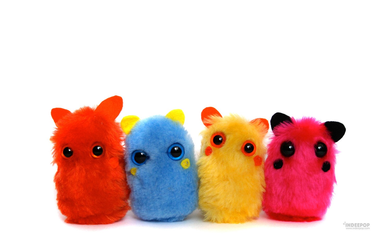 colorful plush toy monsters