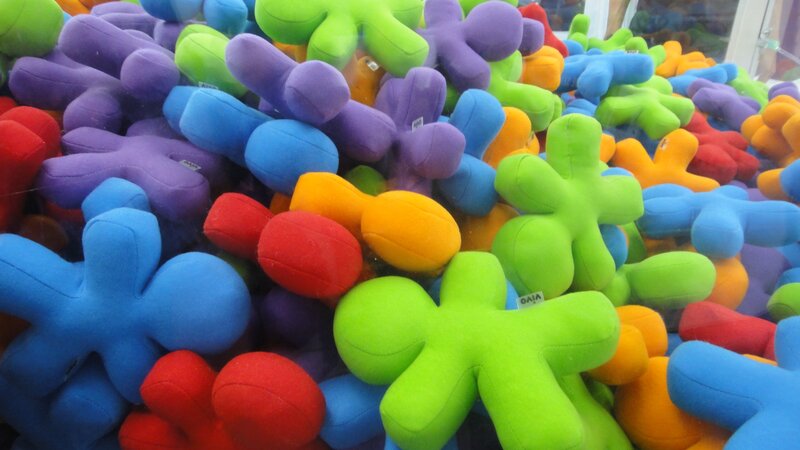 Colorful plush toys in a claw machine