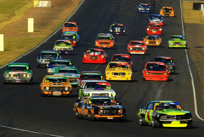 Colorful race cars on a track