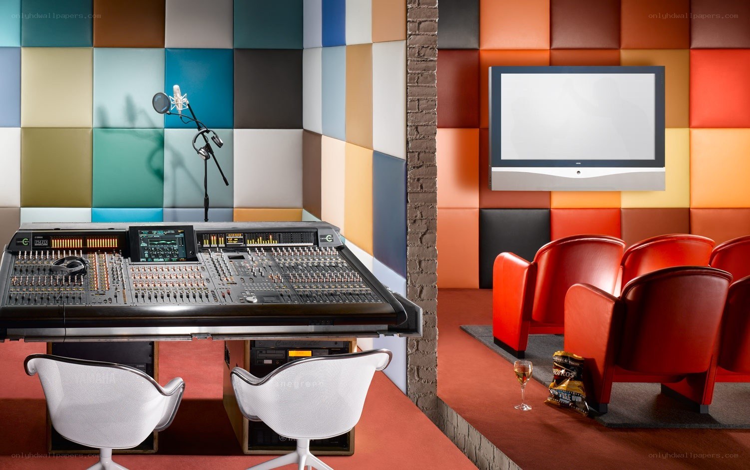 Colorful recording studio with mixing console