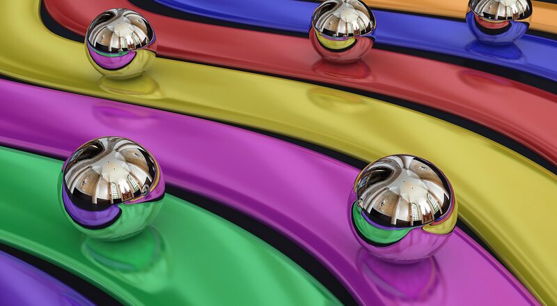 Colorful reflective spheres on tracks