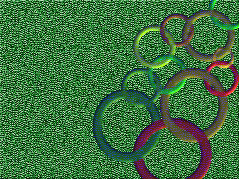Colorful rings on green texture