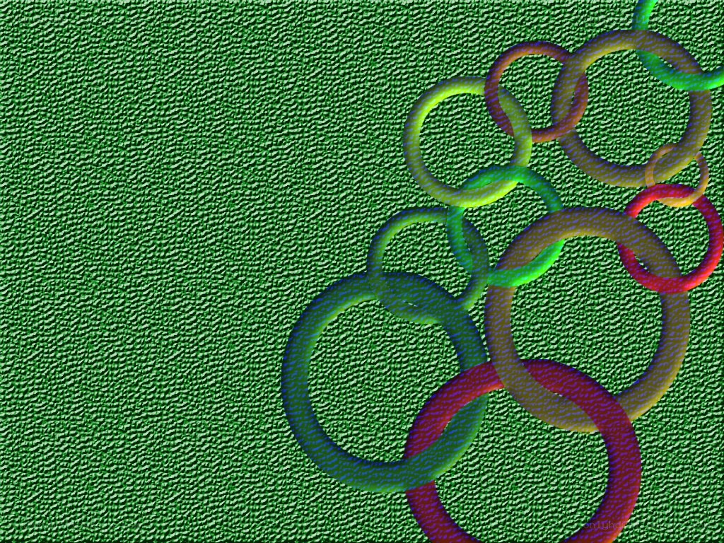 Colorful rings on green texture