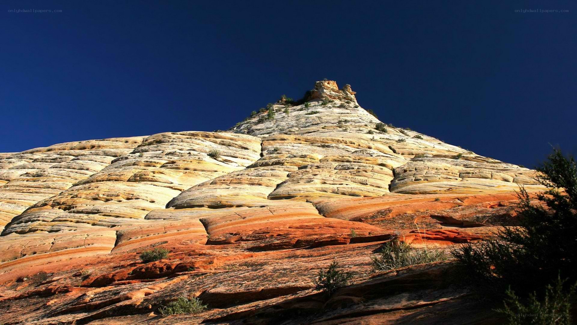 Colorful rock formation under blue sky
