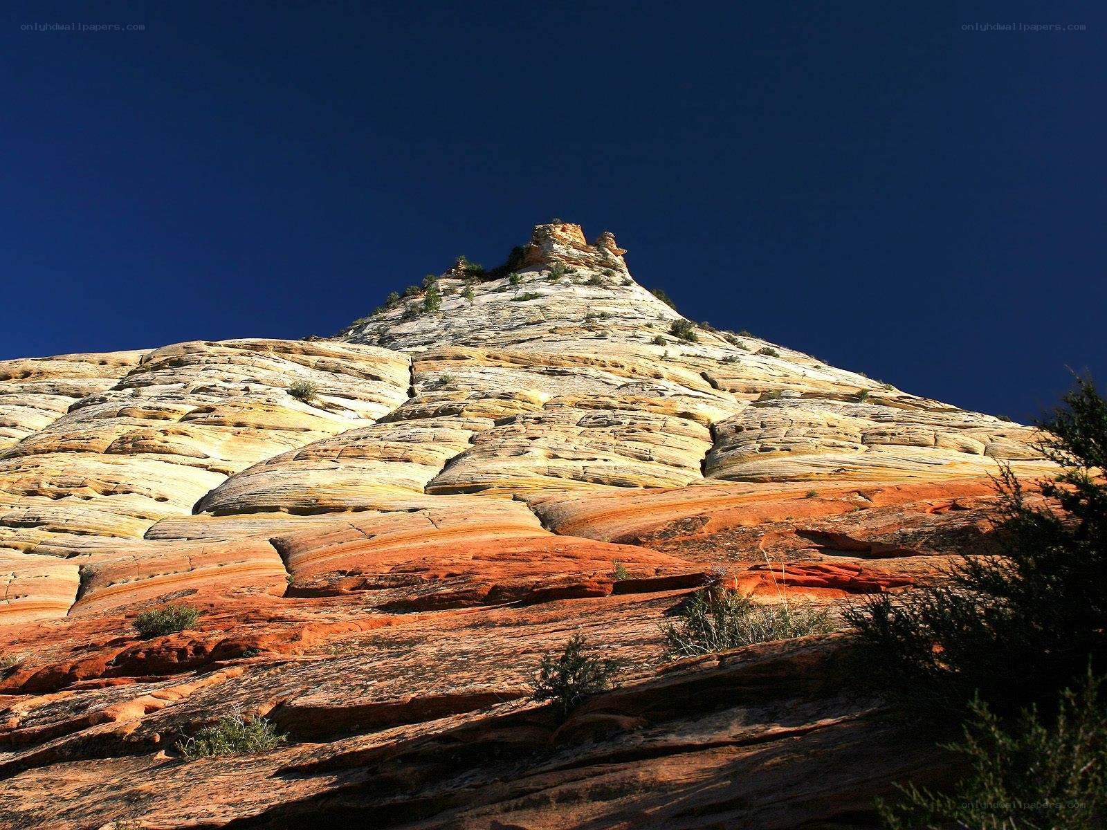 Colorful rock formations under blue sky