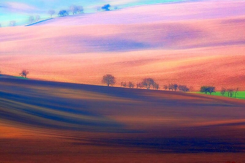 Colorful rolling hills at dawn