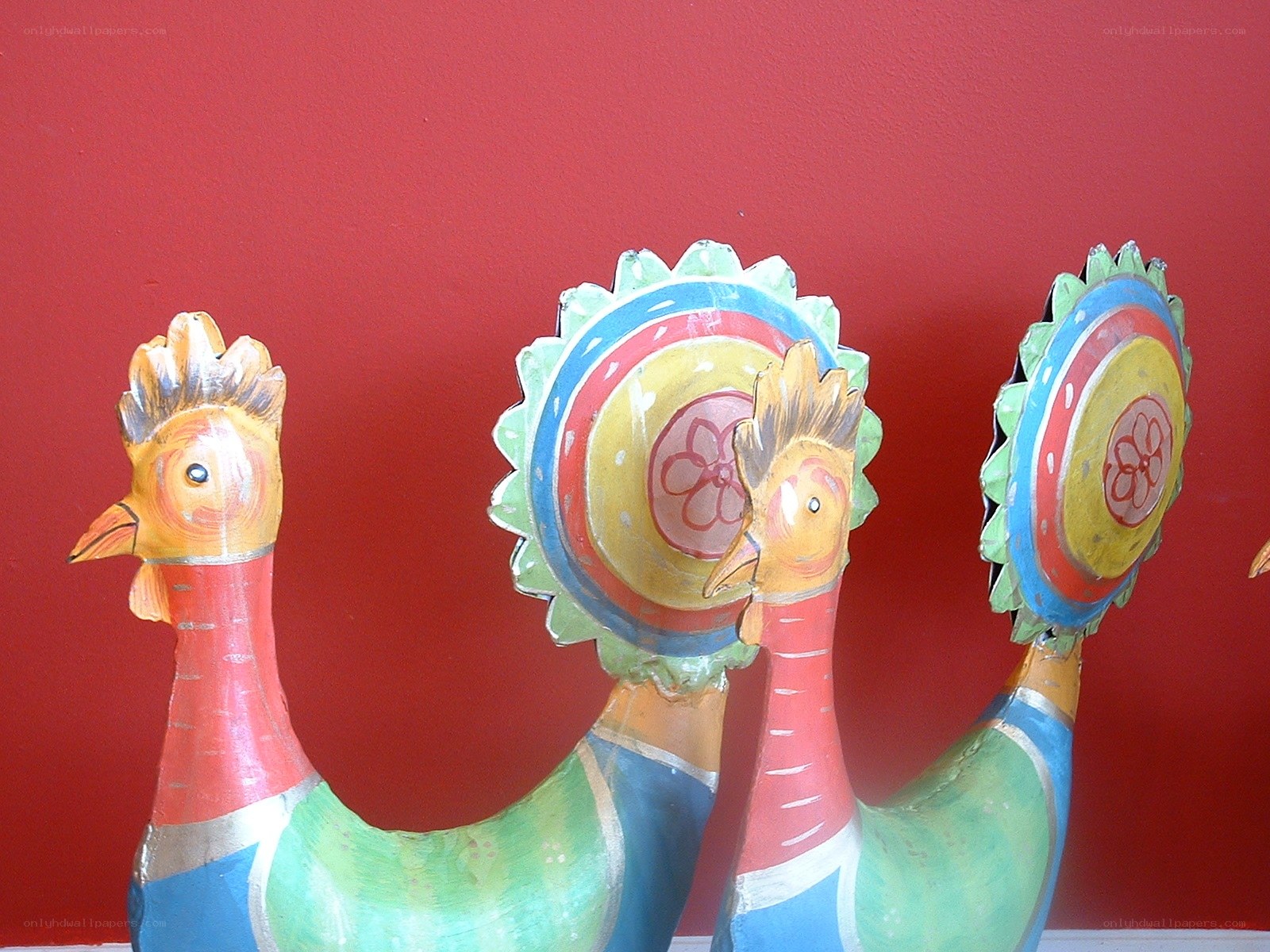 Colorful rooster sculptures