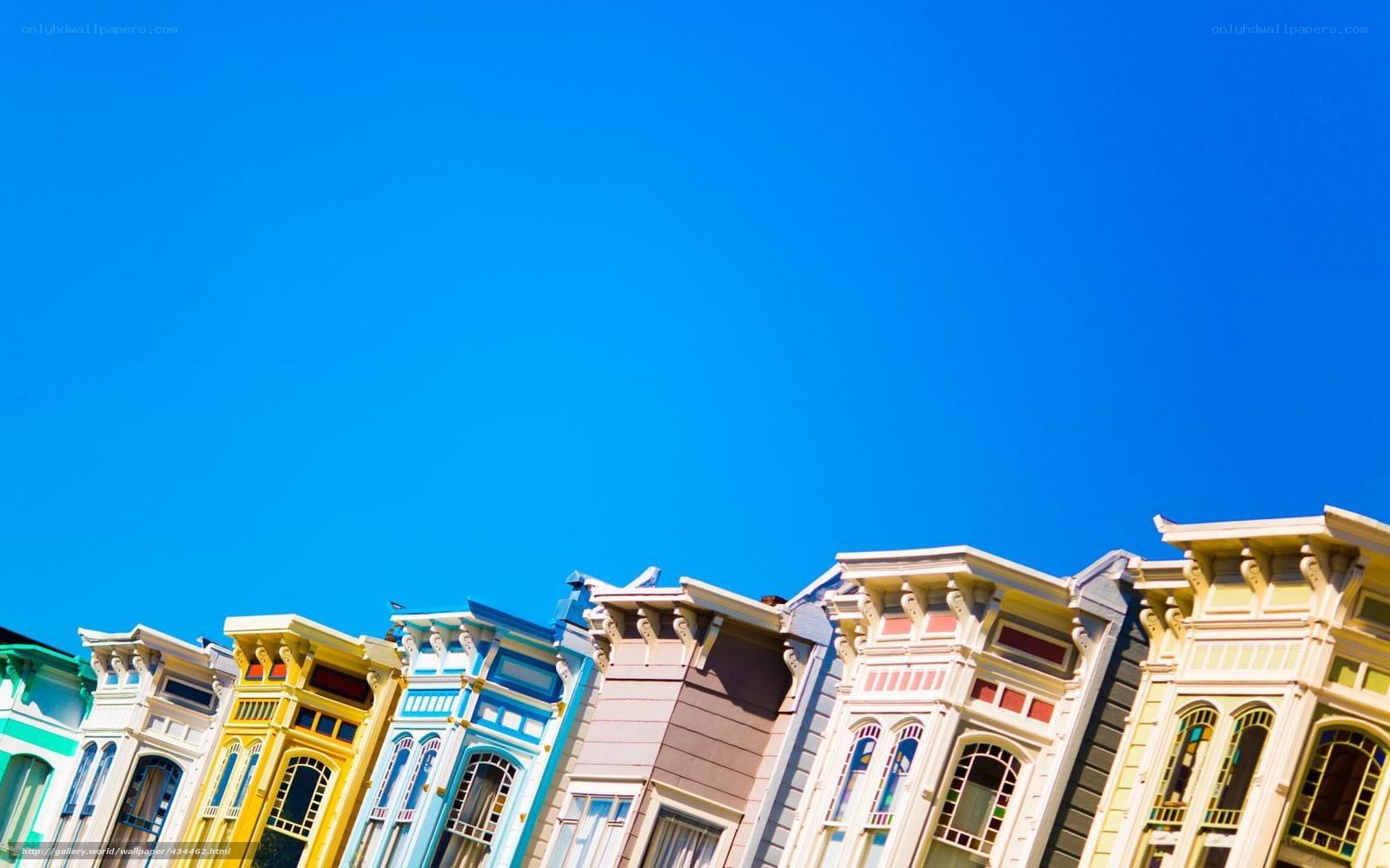 colorful row houses under blue sky