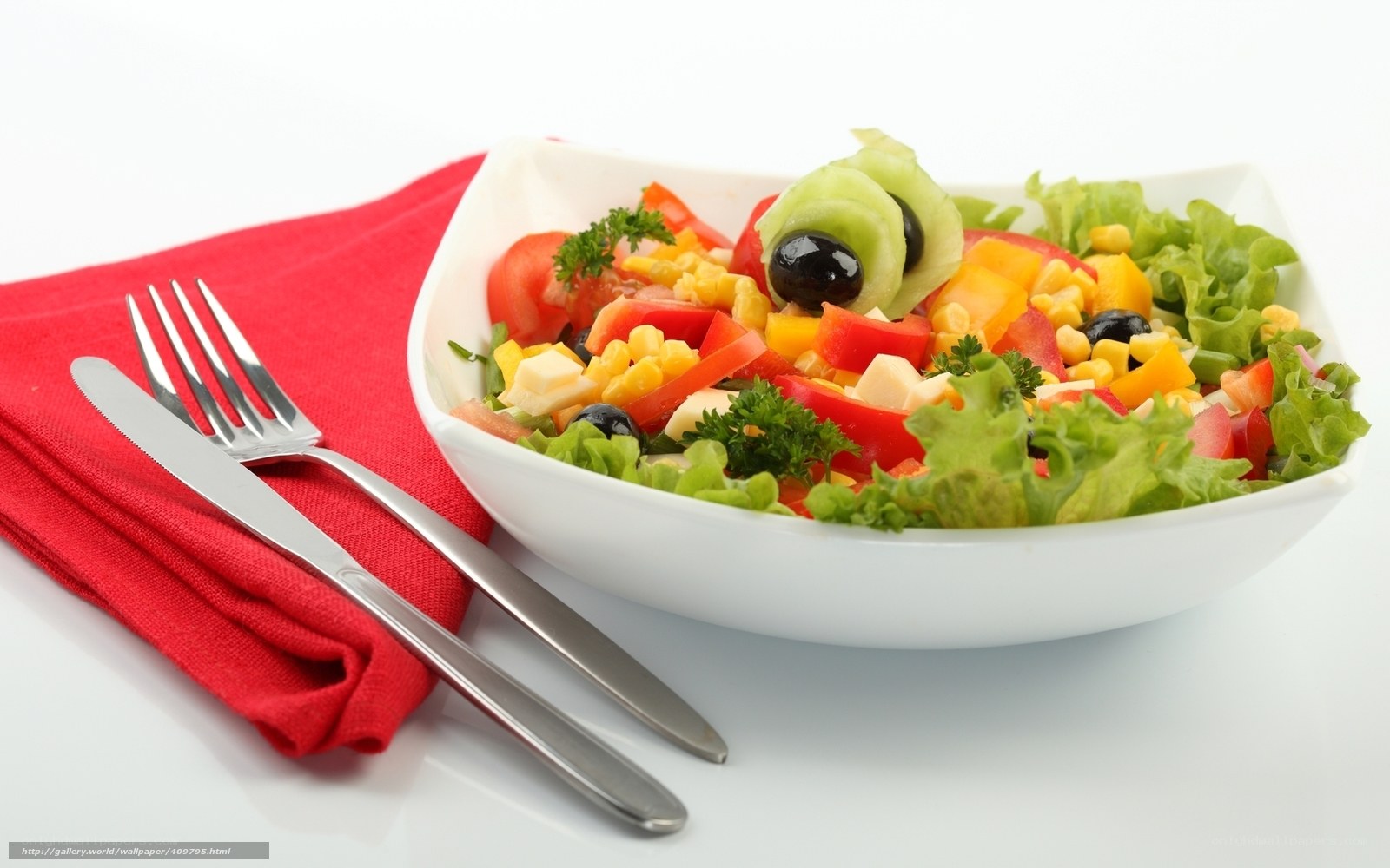 colorful salad in a white bowl