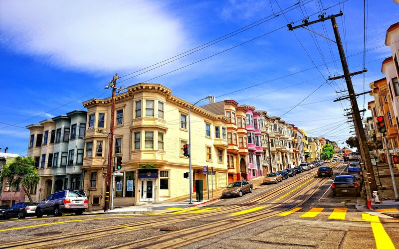 Colorful San Francisco street with cable cars
