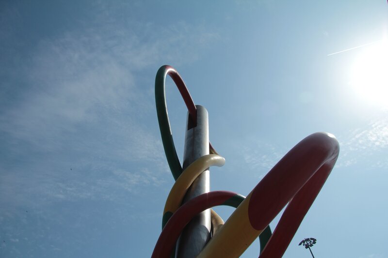 Colorful sculpture against blue sky