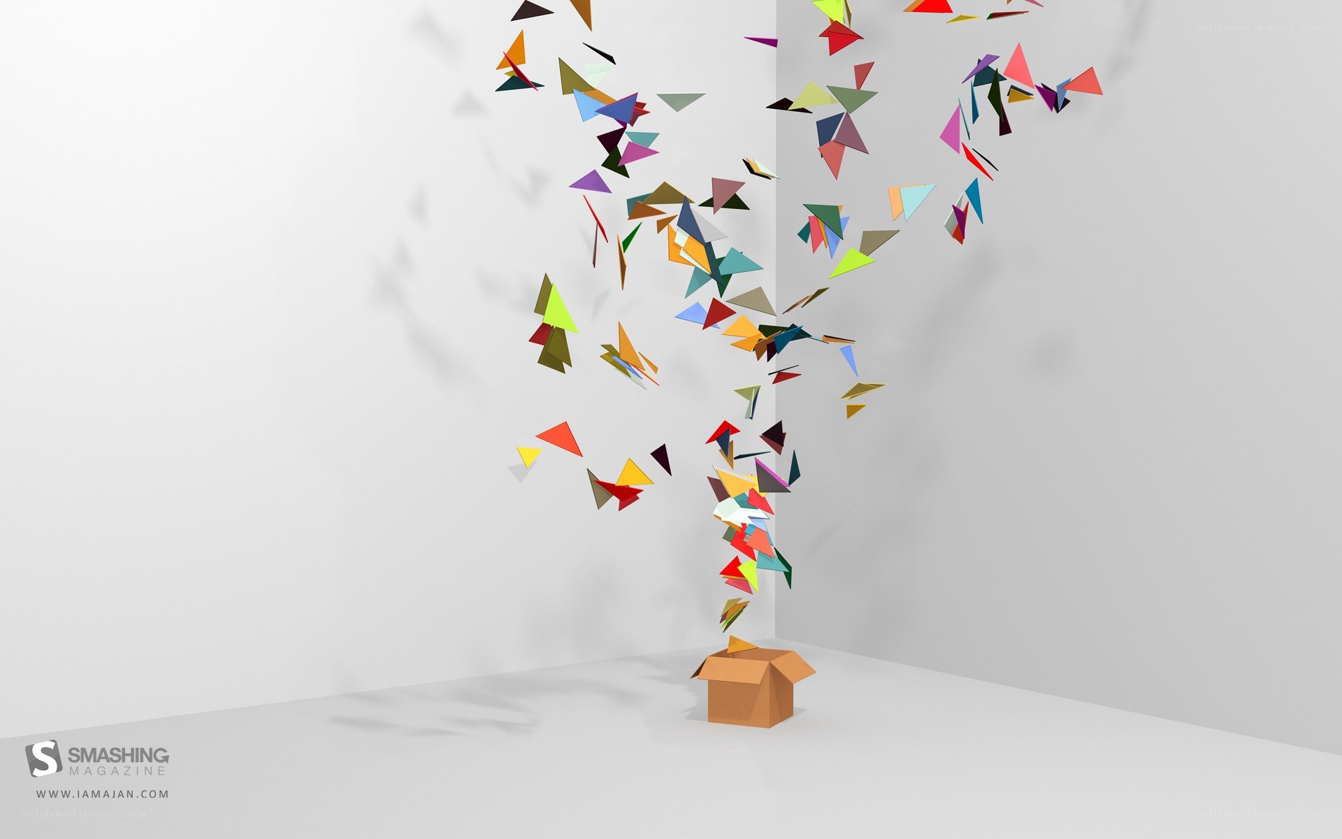 Colorful shapes burst from a box
