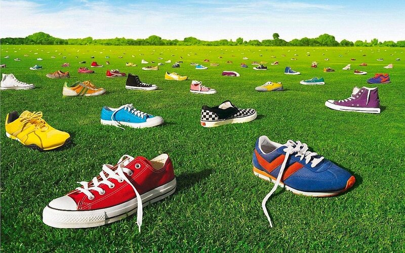 Colorful shoes on a grass field