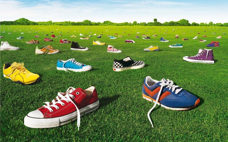 Colorful shoes on a grass field