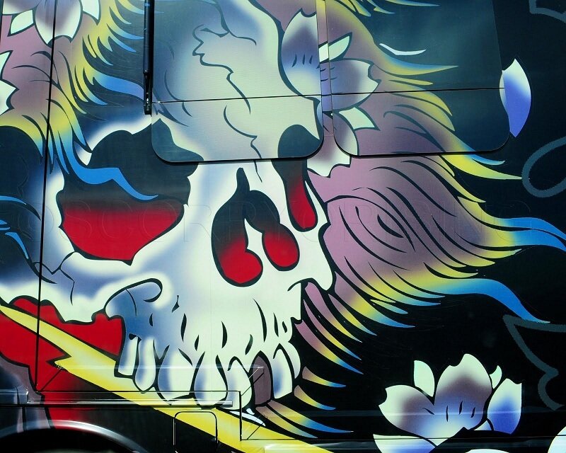 colorful skull mural on truck