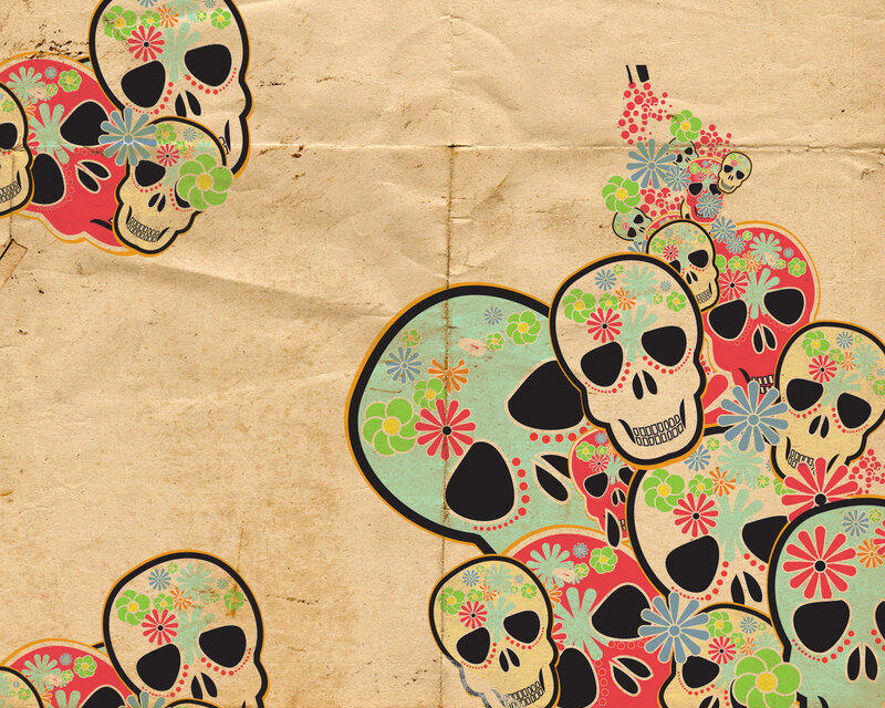 colorful skulls on brown paper