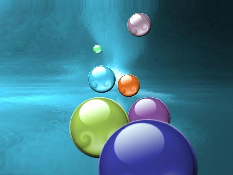 Colorful spheres floating in water