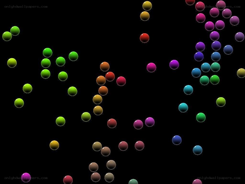 Colorful spheres on black background