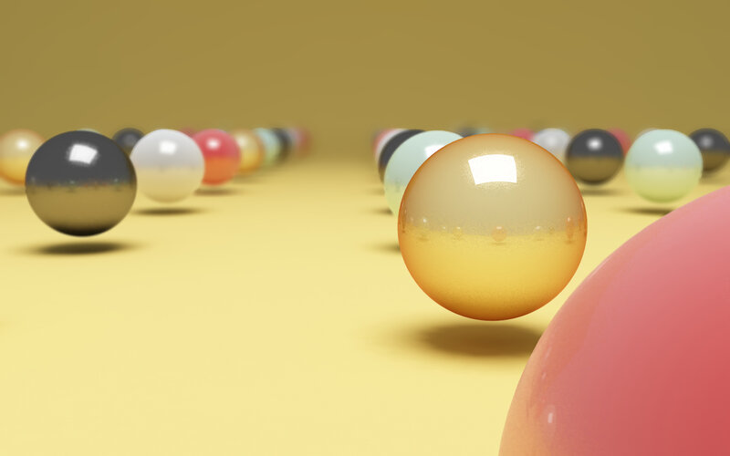 Colorful spheres on yellow surface