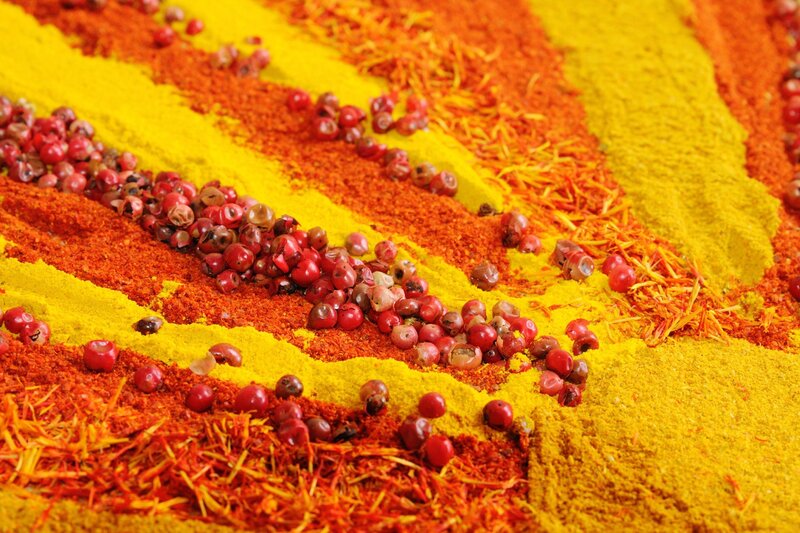 Colorful spices arranged in stripes
