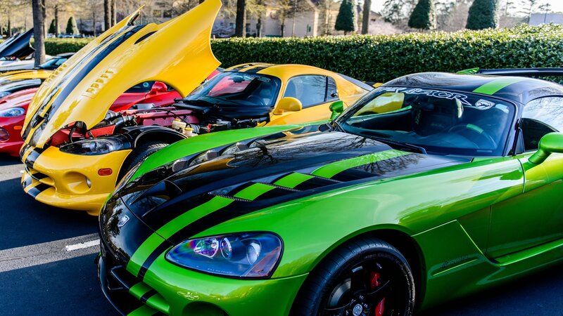 Colorful sports cars at a show
