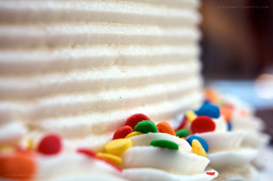 Colorful sprinkles on a cake
