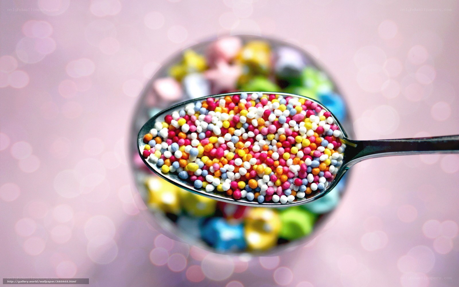 Colorful sprinkles on a spoon