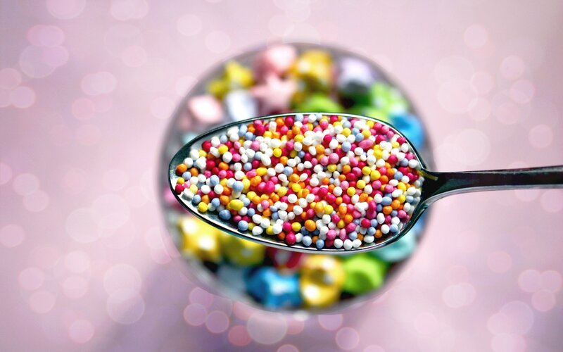 colorful sprinkles on a spoon