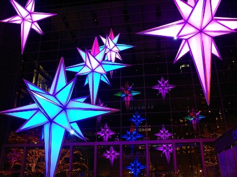 Colorful star decorations at night