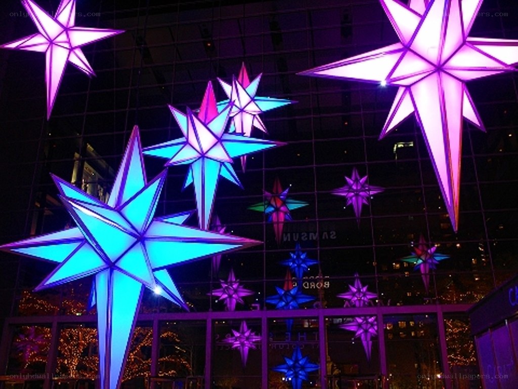 Colorful star decorations at night
