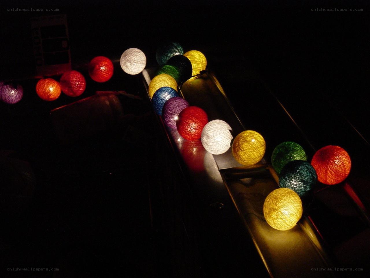 Colorful string lights in dark room