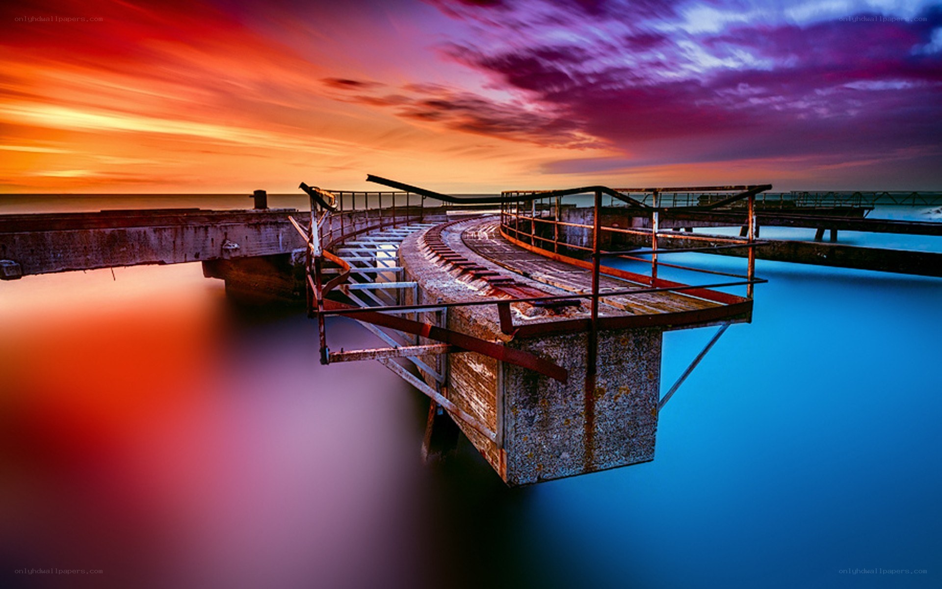 Colorful sunset over a pier