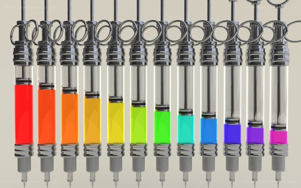 Colorful syringes in a row