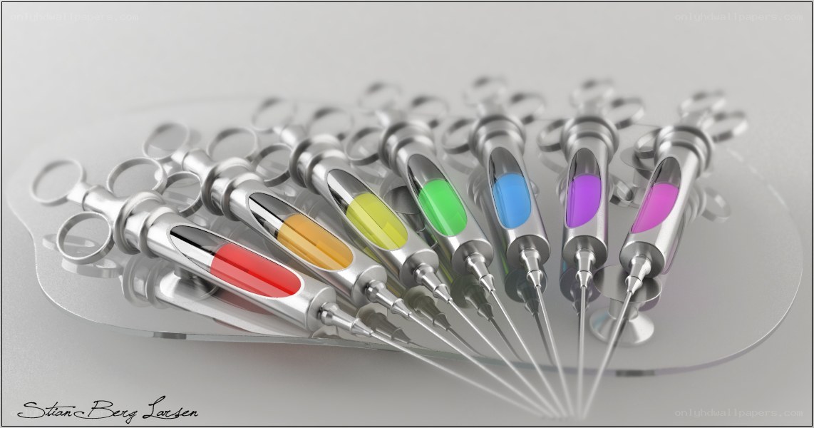 Colorful syringes on tray