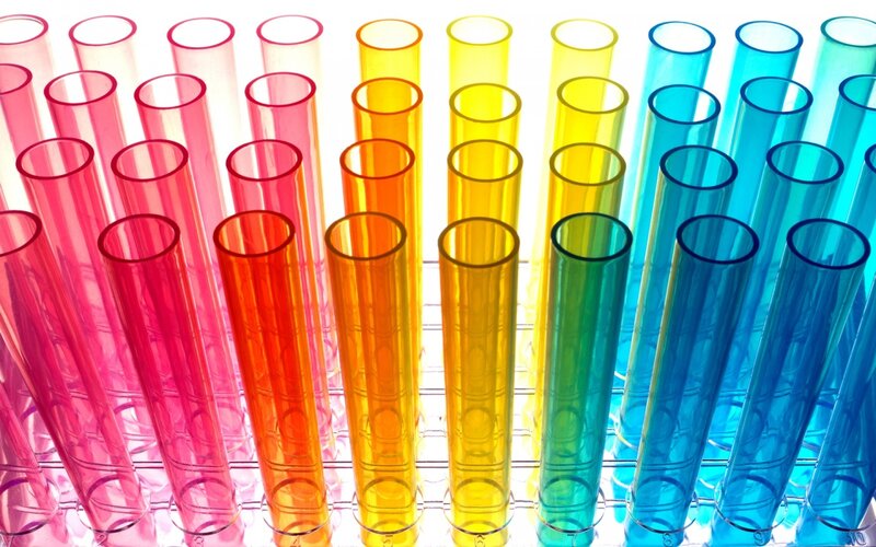 Colorful test tubes in a rack