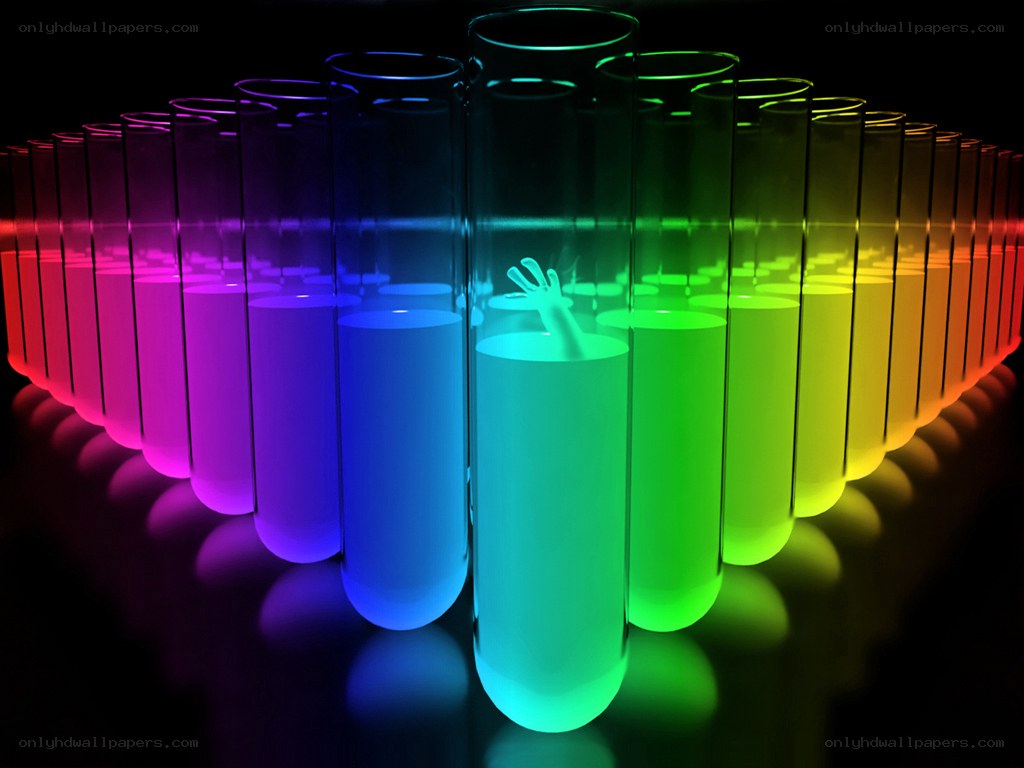 Colorful test tubes with hand