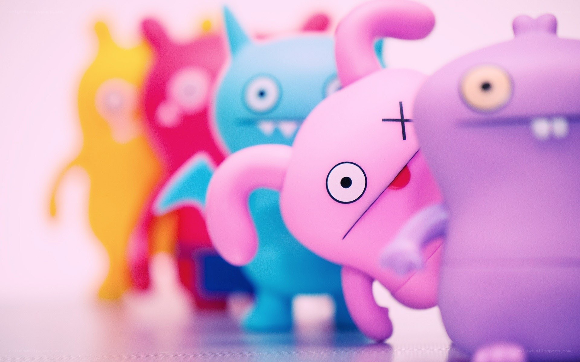 Colorful toy figures in a row