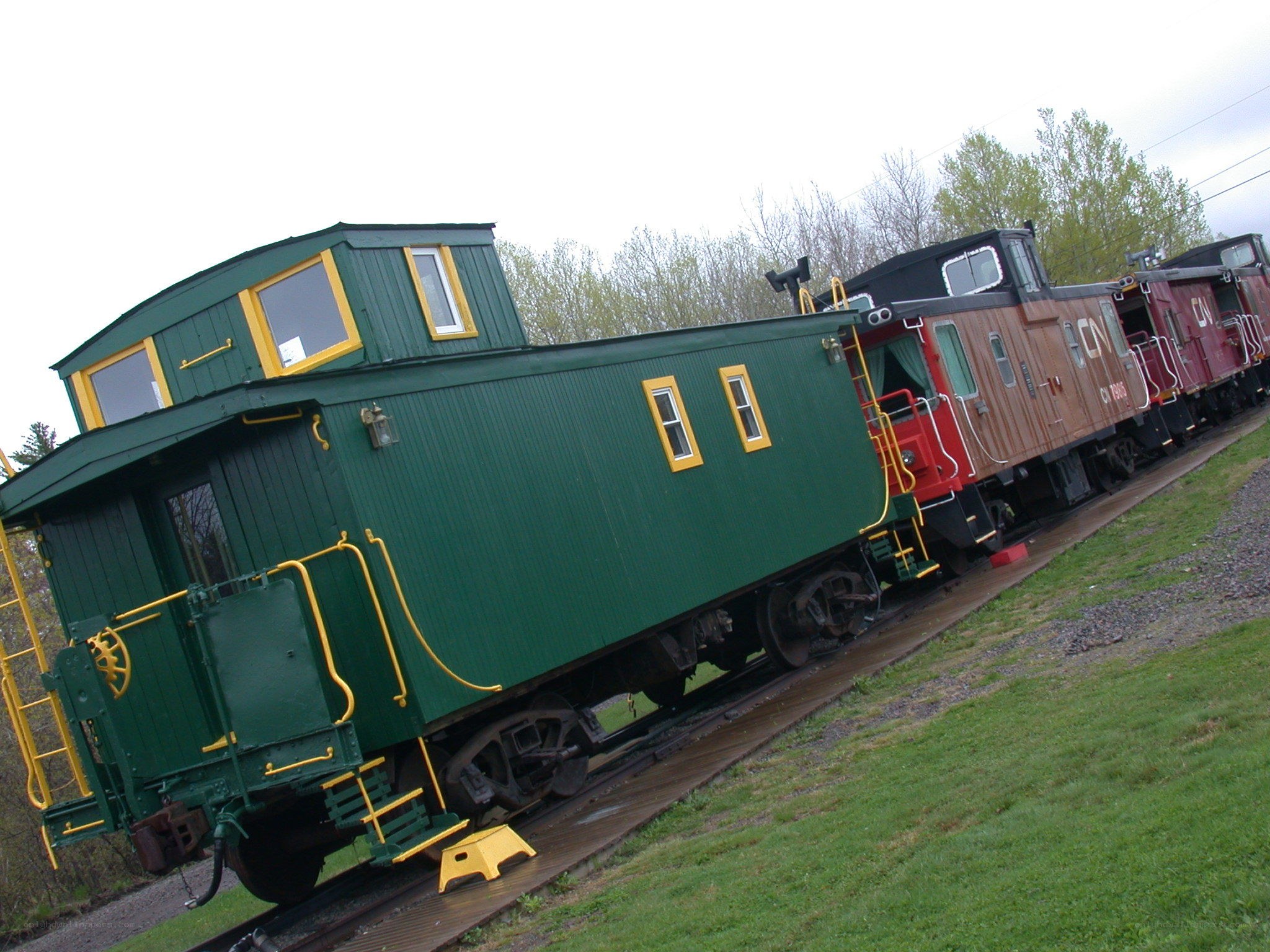 Colorful train cabooses on display