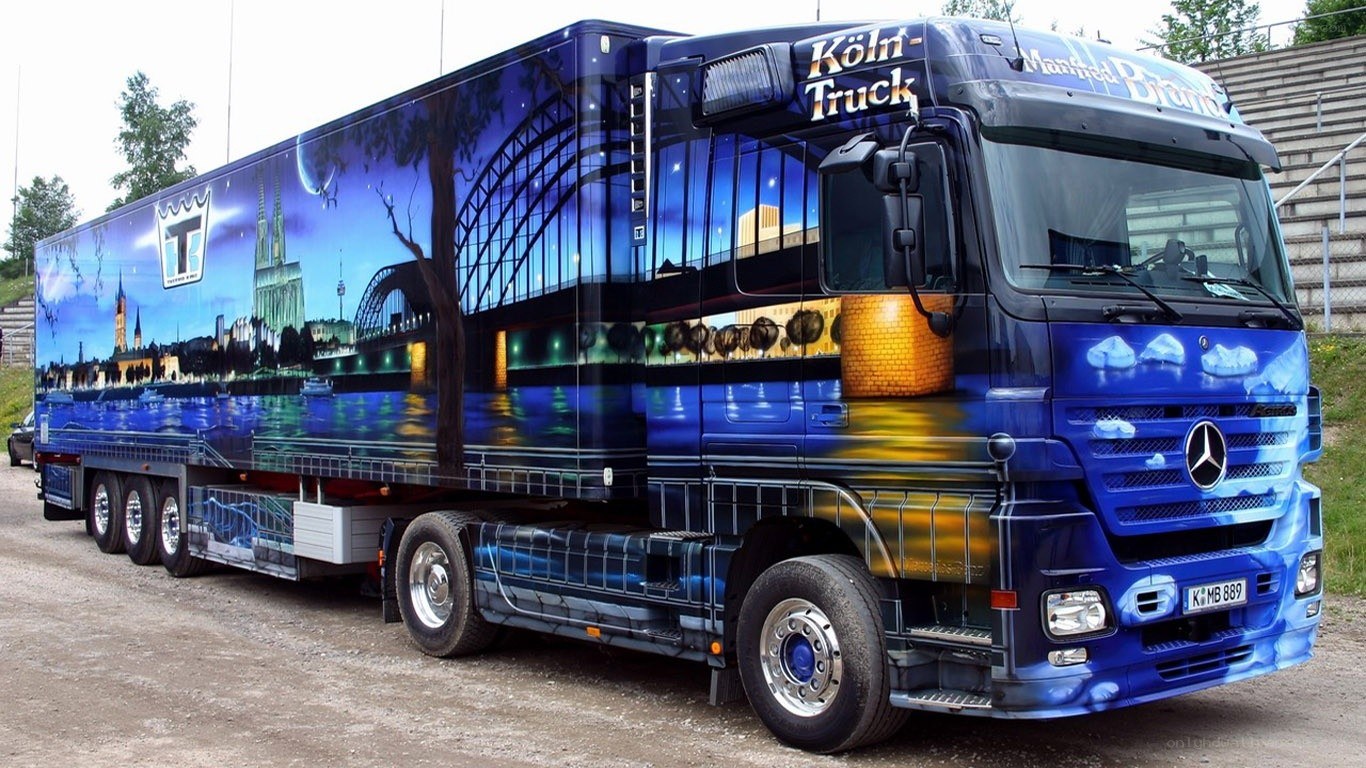colorful truck with cityscape wrap