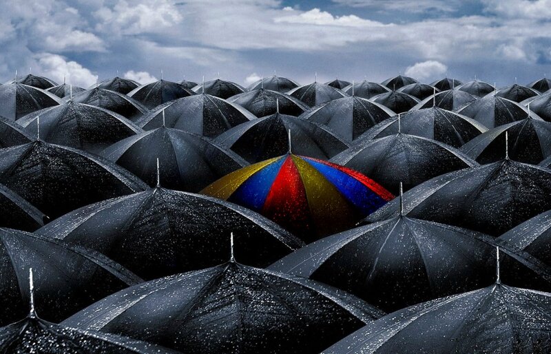 Colorful Umbrella in Crowd