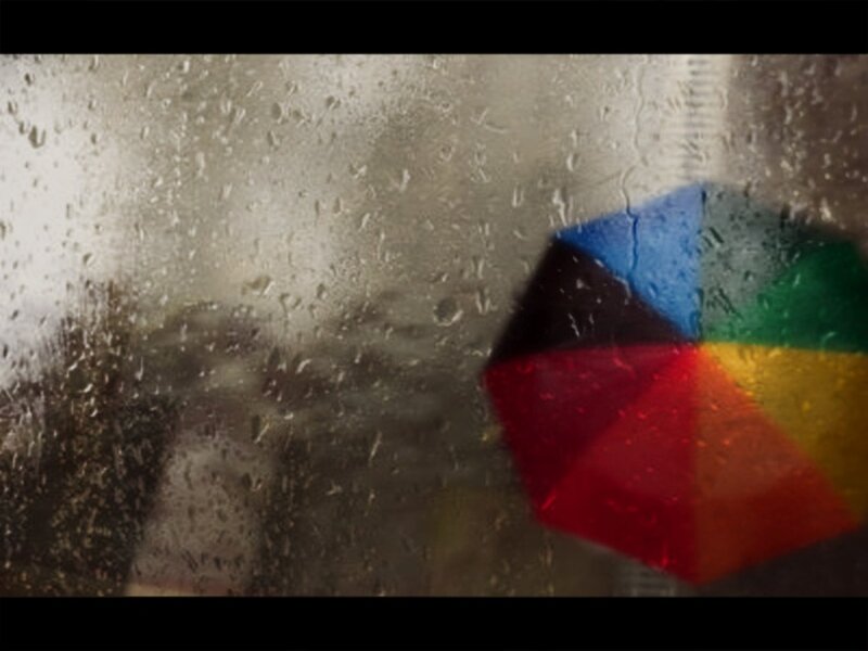 Colorful Umbrella in Rain